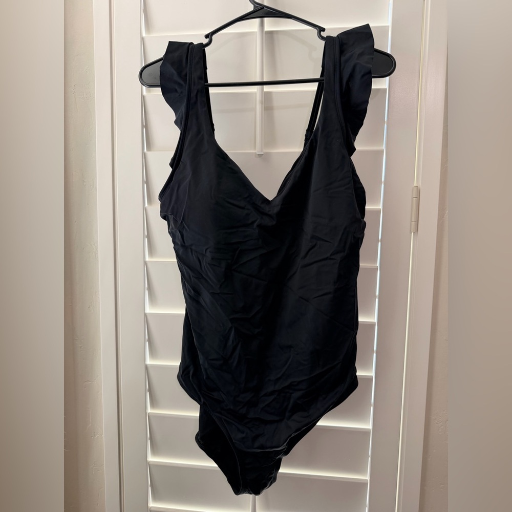 One Piece Ruffle shoulder flattering black swimsuit